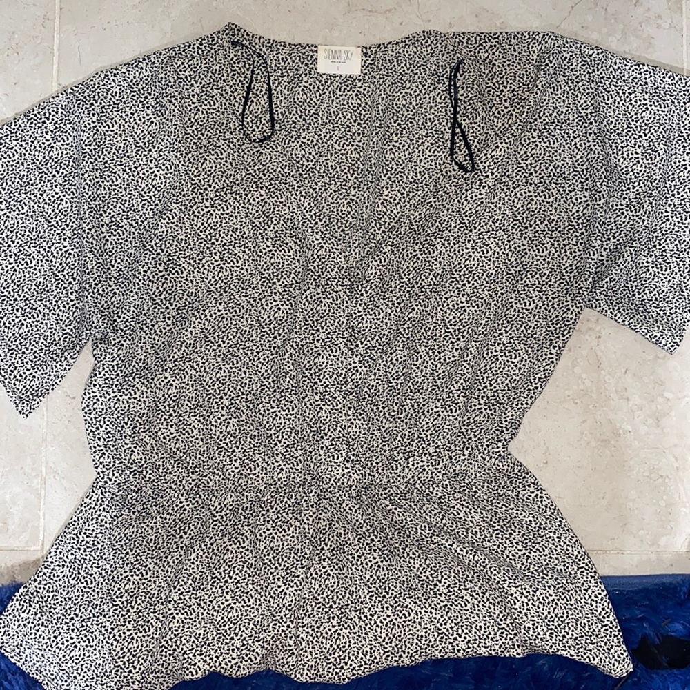 Slight peplum blouse